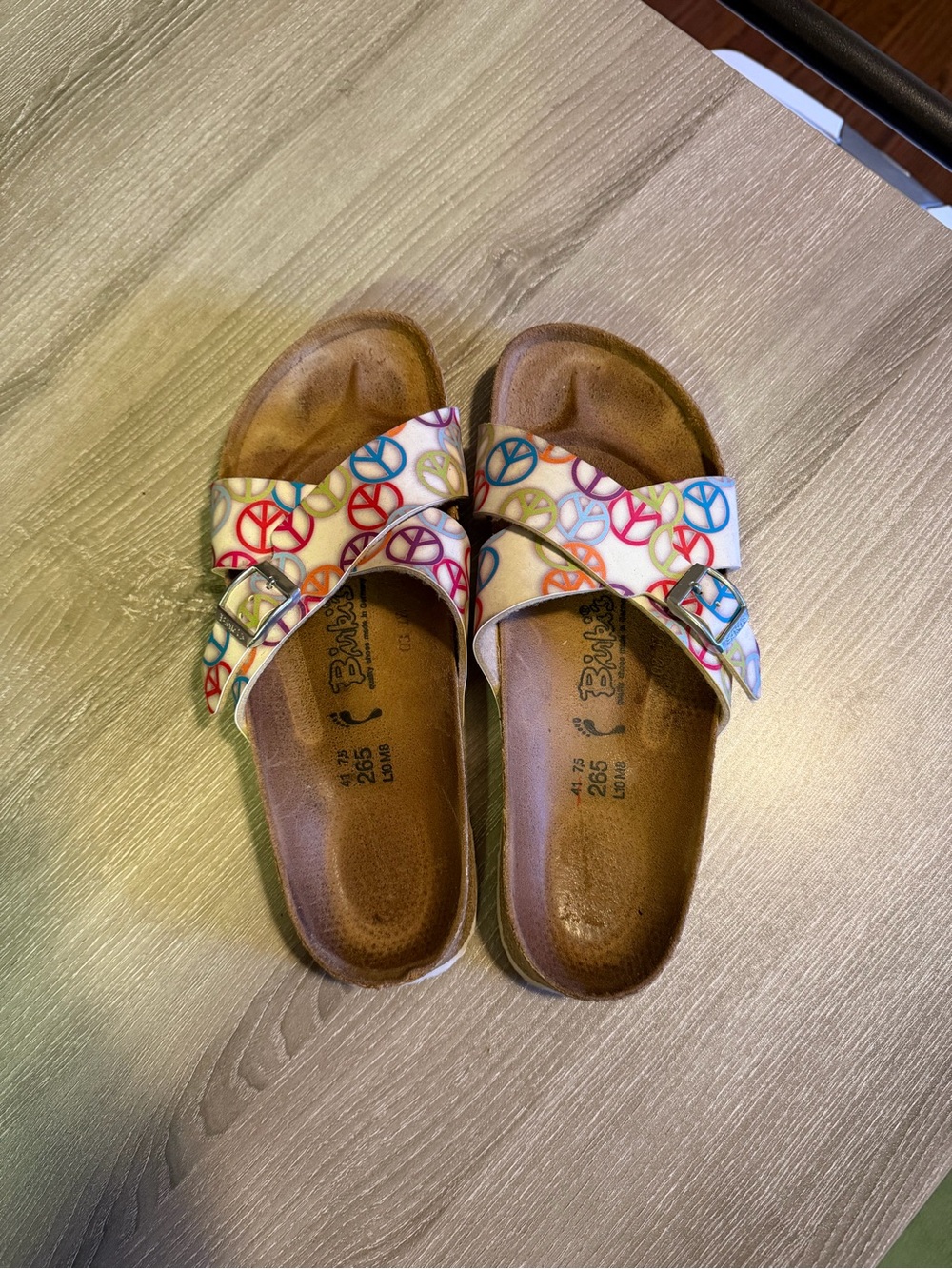 Birkenstock White Sandals with Multicolor Peace Sign Straps